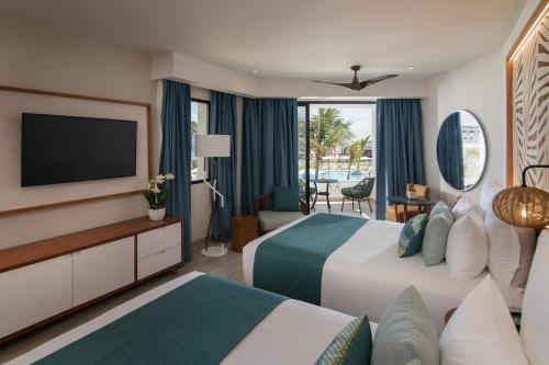 Suite Junior Doble con vistas a la piscina del hotel Dreams Macao Beach Punta Cana