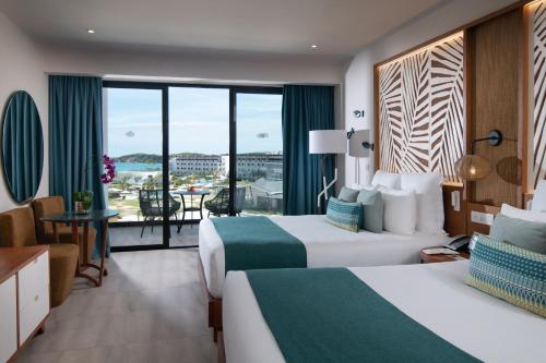 Suite Junior Doble con vistas parciales al océano del hotel Dreams Macao Beach Punta Cana