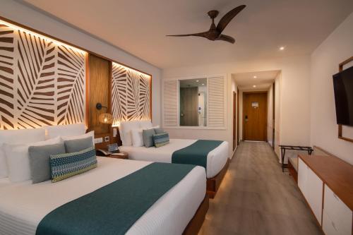 Suite Junior Preferred Club Doble con vistas tropicales del hotel Dreams Macao Beach Punta Cana