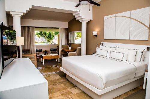 Habitación Premium Tropical Palms del hotel Melia Punta Cana Beach Resort - Adults Only All Inclusive. Foto 4