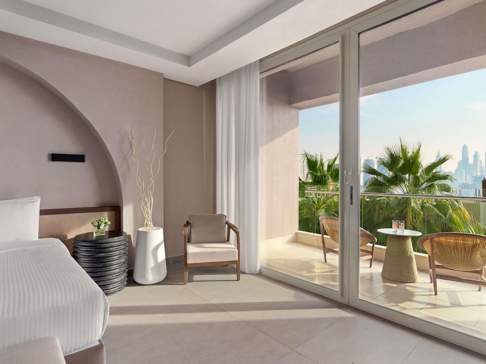 Habitación Deluxe, 1 cama de matrimonio grande del hotel Rixos The Palm & Suites