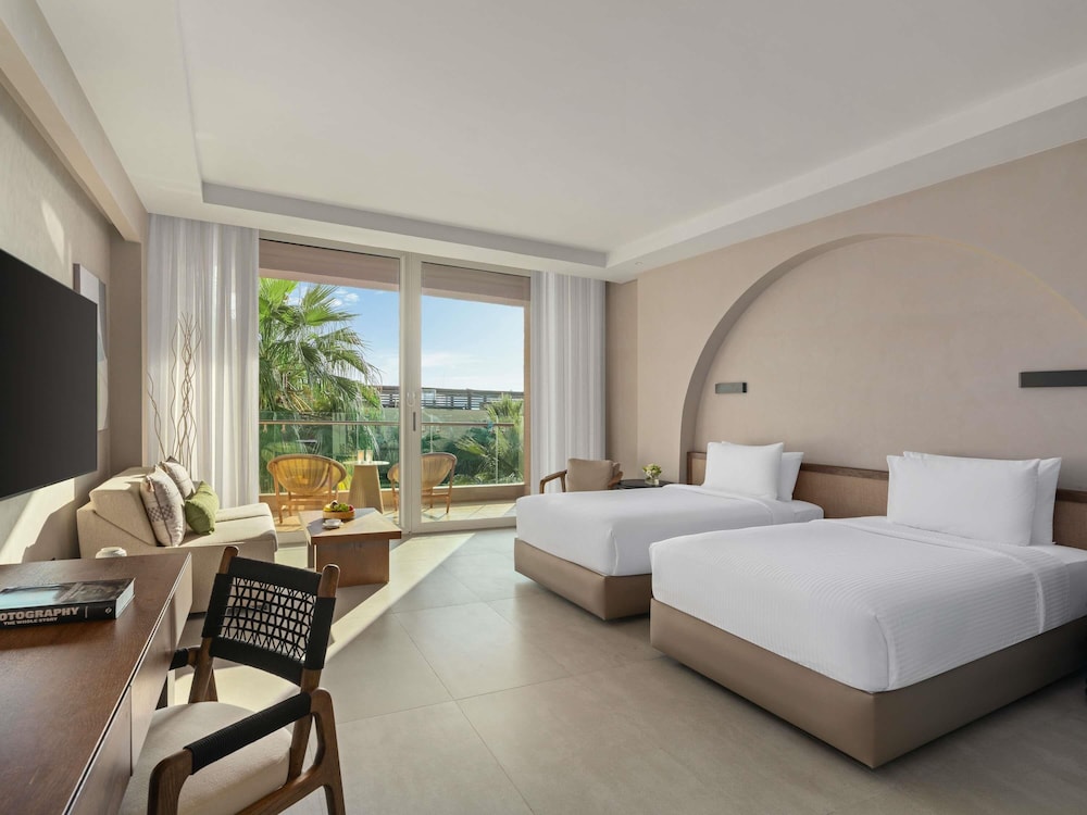 Habitación Deluxe, 1 cama de matrimonio grande del hotel Rixos The Palm & Suites. Foto 1