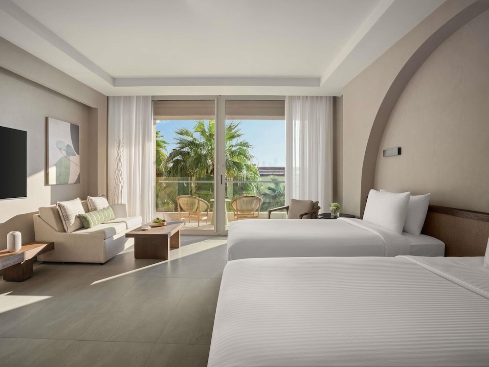 Habitación Deluxe, 1 cama de matrimonio grande del hotel Rixos The Palm & Suites. Foto 2