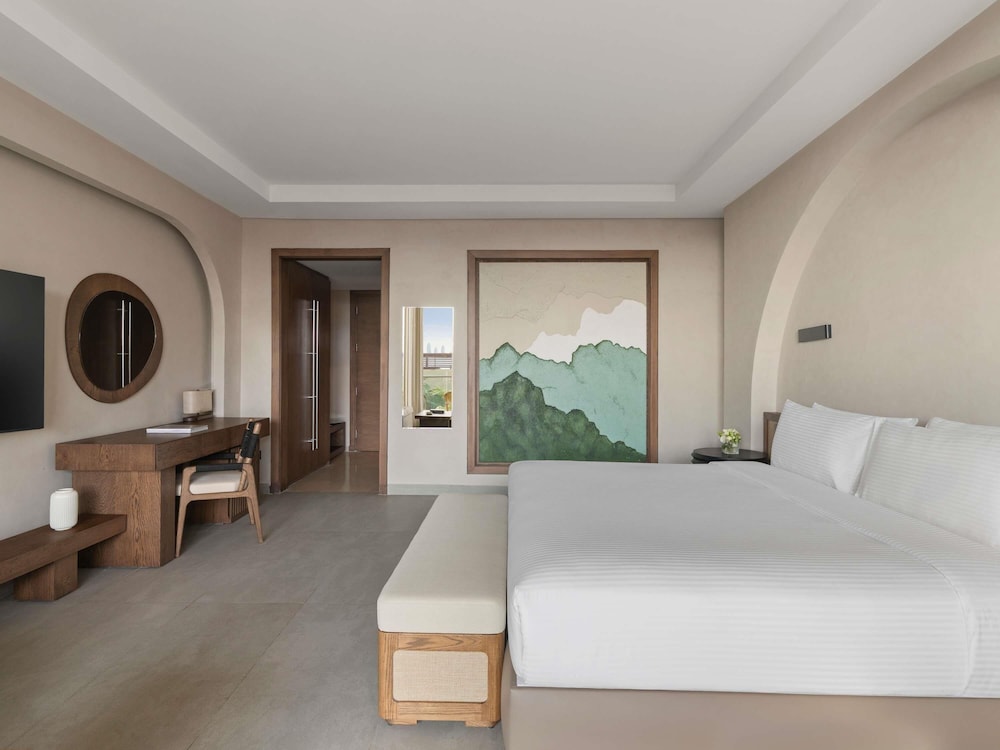 Habitación Deluxe, 1 cama de matrimonio grande del hotel Rixos The Palm & Suites. Foto 3