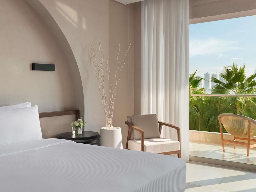 Habitación Deluxe, 1 cama de matrimonio grande del hotel Rixos The Palm & Suites. Foto 4