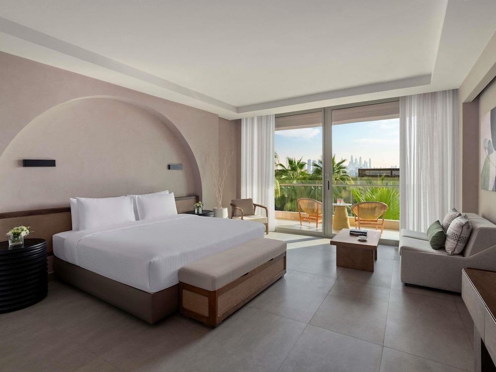 Habitación Deluxe, 1 cama de matrimonio grande del hotel Rixos The Palm & Suites. Foto 7