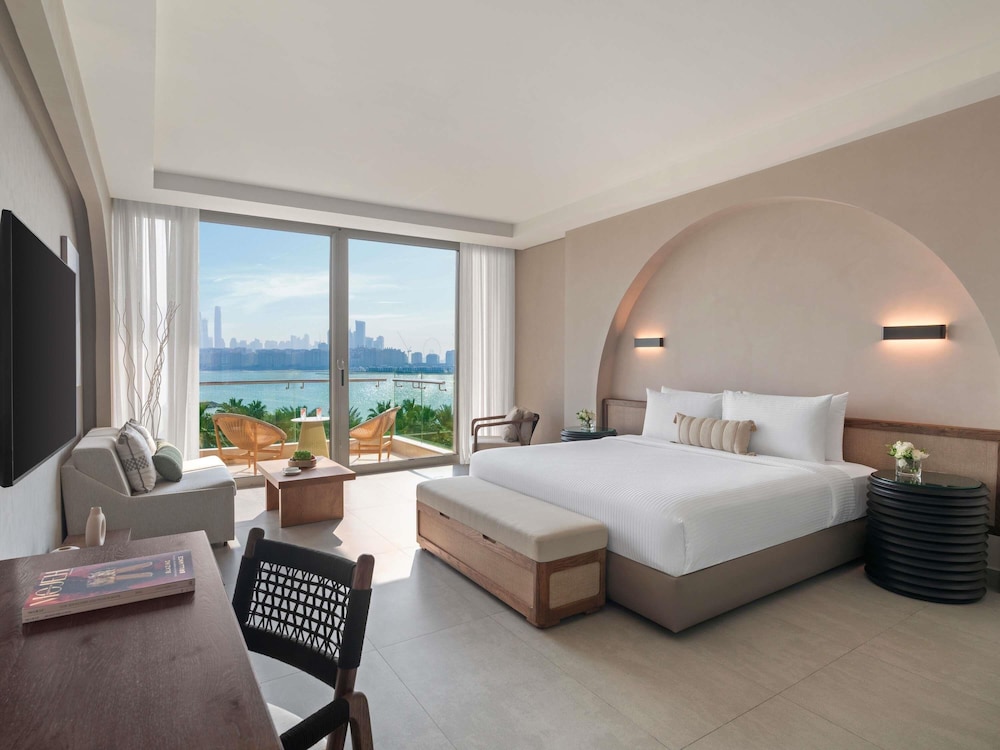 Habitación Deluxe, 1 cama de matrimonio grande, vistas al mar del hotel Rixos The Palm & Suites. Foto 1