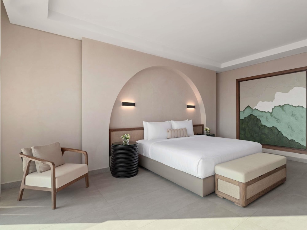 Habitación Deluxe, 1 cama de matrimonio grande, vistas al mar del hotel Rixos The Palm & Suites. Foto 7