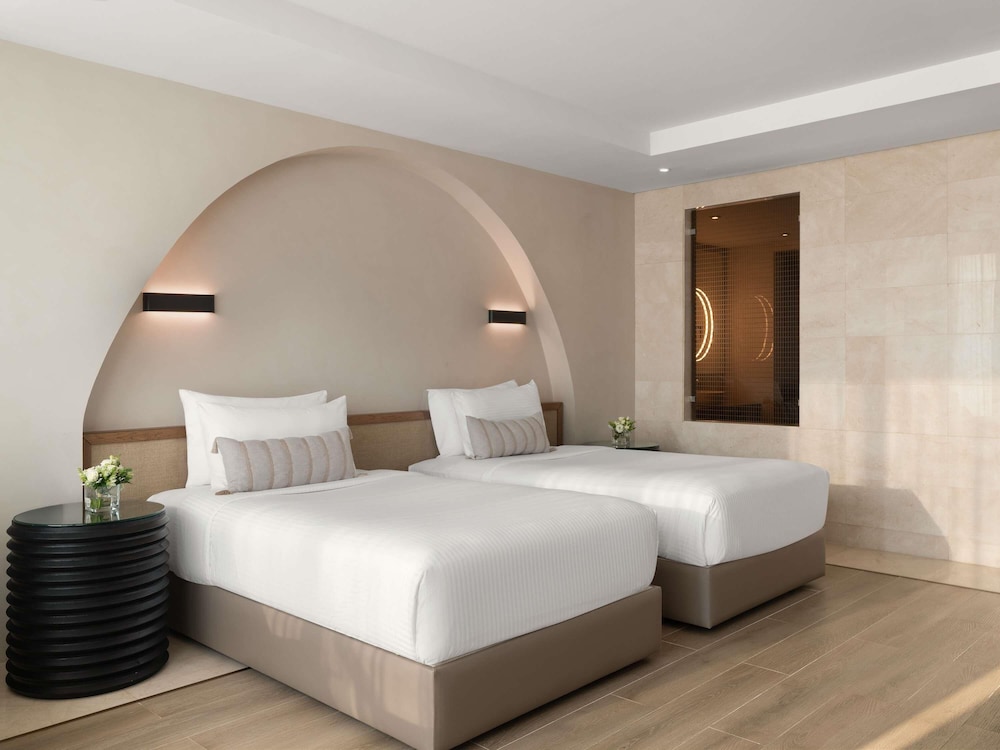Habitación Deluxe, 1 cama de matrimonio grande, vistas al mar del hotel Rixos The Palm & Suites. Foto 9