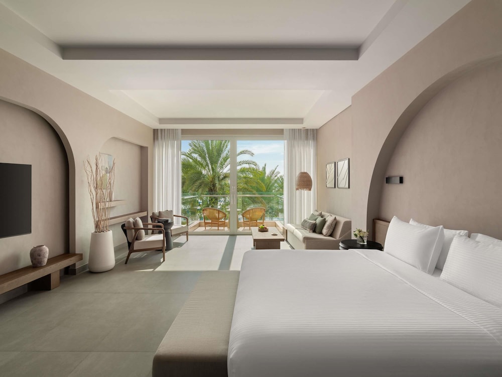 Habitación Premium, 1 cama de matrimonio grande, vistas al jardín del hotel Rixos The Palm & Suites. Foto 2