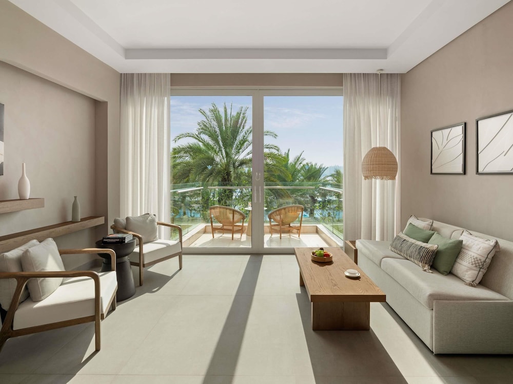 Habitación Premium, 1 cama de matrimonio grande, vistas al jardín del hotel Rixos The Palm & Suites. Foto 3