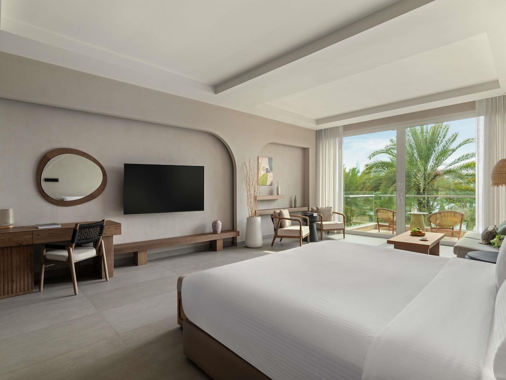 Habitación Premium, 1 cama de matrimonio grande, vistas al jardín del hotel Rixos The Palm & Suites. Foto 4