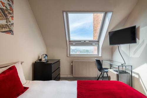 Habitación Doble Pequeña del hotel Martin's Brussels Eu. Foto 1