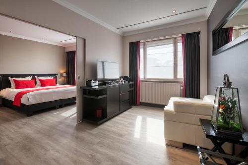 Habitación Doble Deluxe del hotel Martin's Brussels Eu. Foto 1