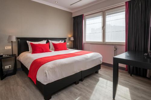 Habitación Doble Deluxe del hotel Martin's Brussels Eu. Foto 10