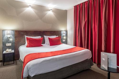 Habitación con cama extragrande. del hotel Martin's Brussels Eu. Foto 1