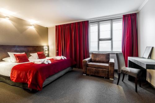 Habitación con cama extragrande. del hotel Martin's Brussels Eu. Foto 3