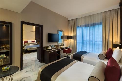 Habitación Doble Deluxe con balcón - 2 camas del hotel Millennium Place Marina