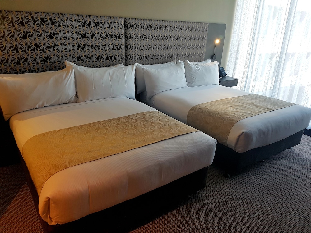 Habitación superior, 2 camas dobles del hotel Pullman Brisbane Airport. Foto 1