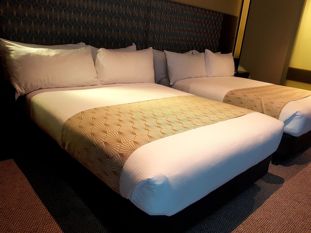 Habitación superior, 2 camas dobles del hotel Pullman Brisbane Airport. Foto 2
