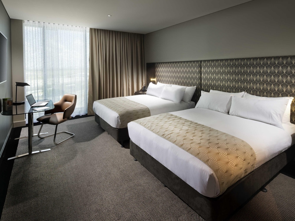 Habitación Deluxe Ejecutiva, Acceso al Salón, 2 camas dobles del hotel Pullman Brisbane Airport