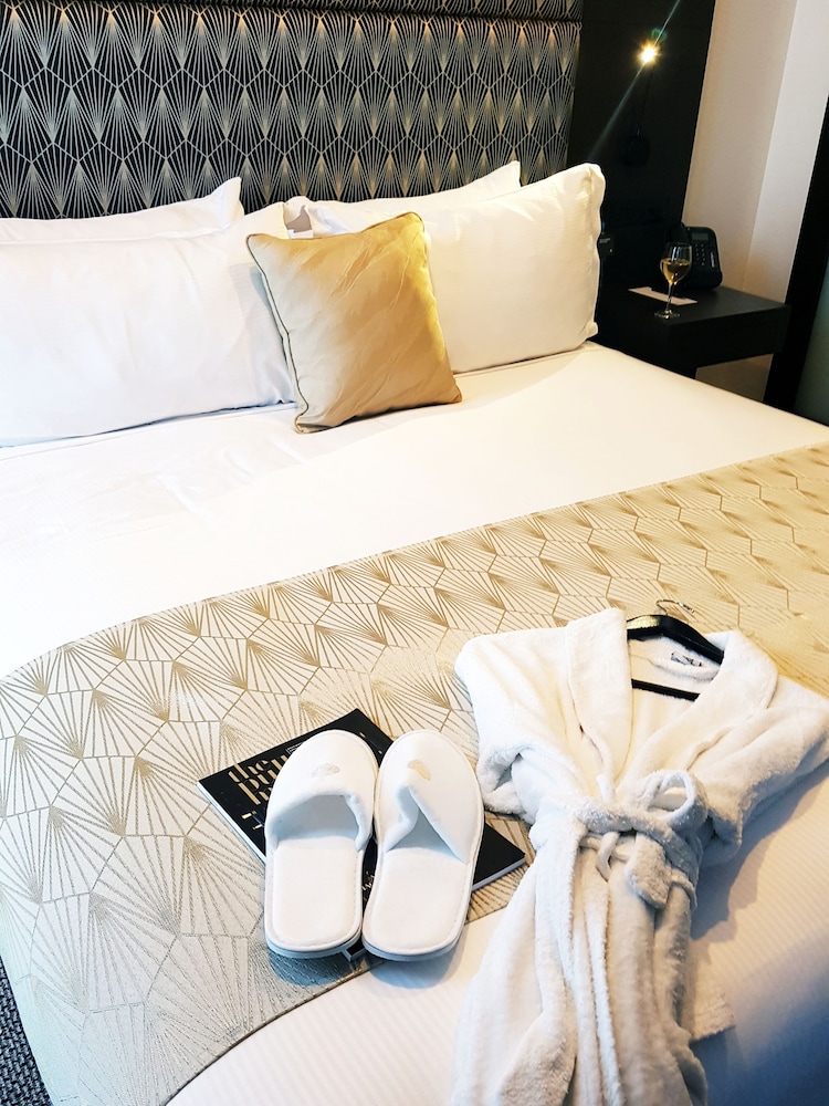Suite Junior, Acceso al Salón, 1 cama King Size del hotel Pullman Brisbane Airport. Foto 2