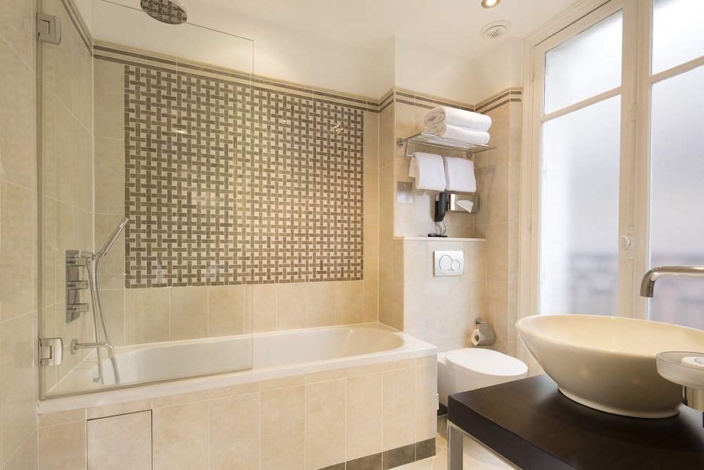 Habitación superior con 2 camas individuales del hotel Ares Eiffel. Foto 3