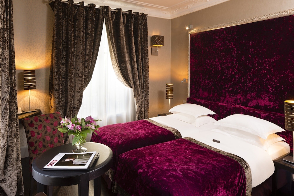 Habitación superior con 2 camas individuales del hotel Ares Eiffel. Foto 4