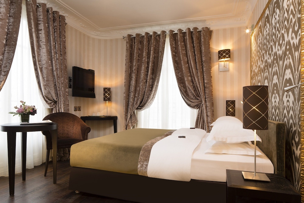 Habitación superior con 2 camas individuales del hotel Ares Eiffel. Foto 6