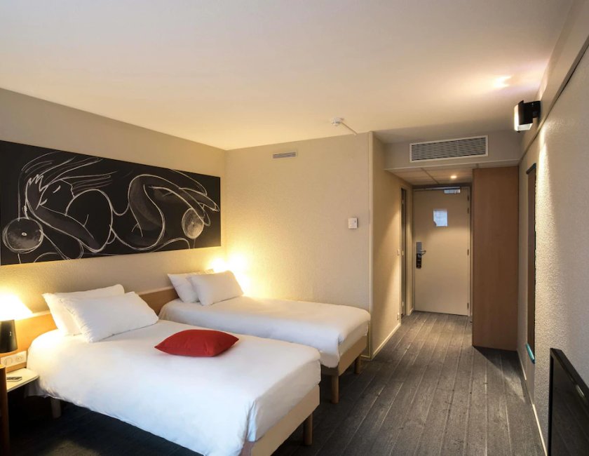 Habitación doble 2 Camas individuales del hotel ibis Metz Woippy. Foto 1
