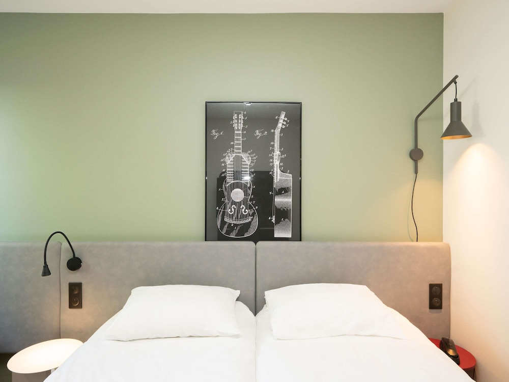 Habitación estándar con dos camas individuales del hotel ibis Reims Tinqueux. Foto 2