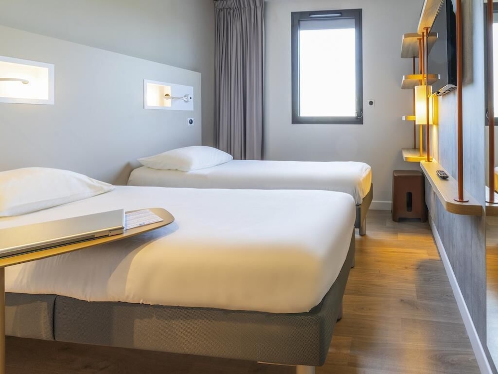 Habitación con 2 camas individuales, 2 camas individuales del hotel Ibis Budget Saint-Etienne Centre Gare Châteaucreux. Foto 5