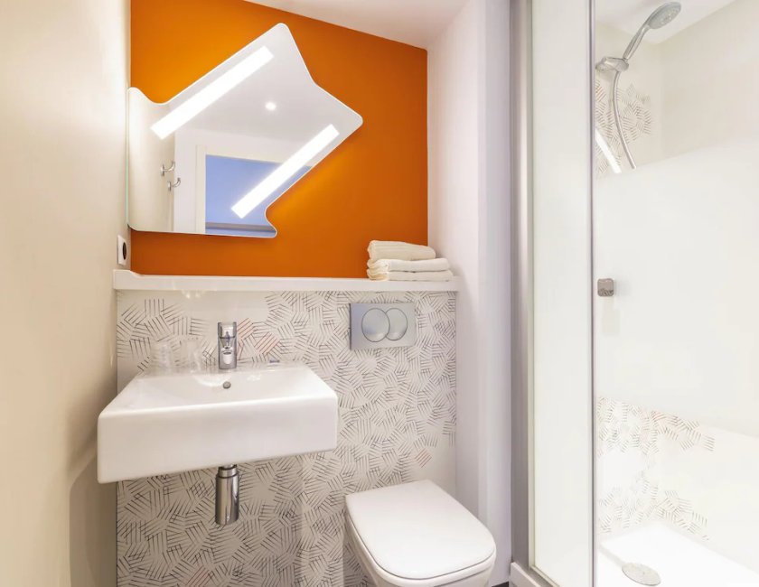 Habitación con 2 camas individuales, 2 camas individuales del hotel Ibis Budget Saint-Etienne Centre Gare Châteaucreux. Foto 4