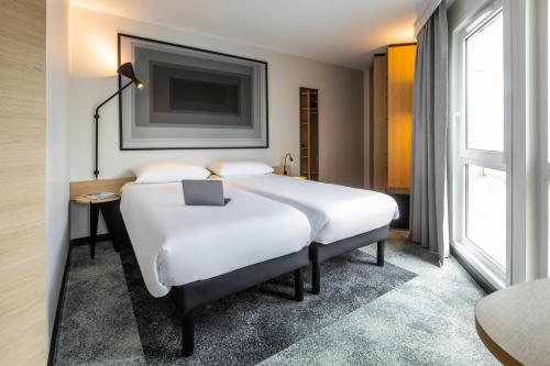 Habitación Doble Estándar - 2 camas del hotel ibis Nancy Centre Sainte Catherine. Foto 4