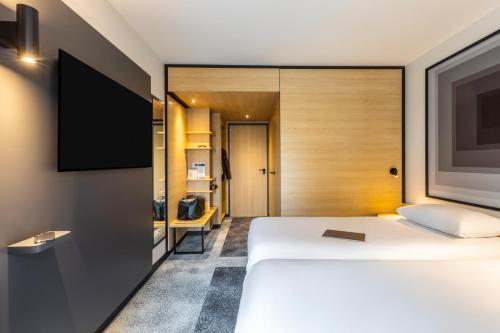 Habitación Doble Estándar con 2 camas dobles del hotel ibis Nancy Centre Sainte Catherine. Foto 3