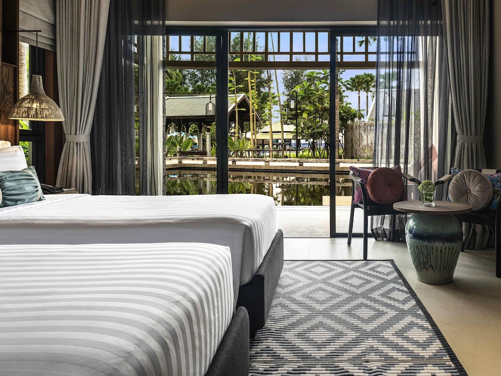 Habitación deluxe con camas gemelas del hotel Grand Mercure Khao Lak Bangsak