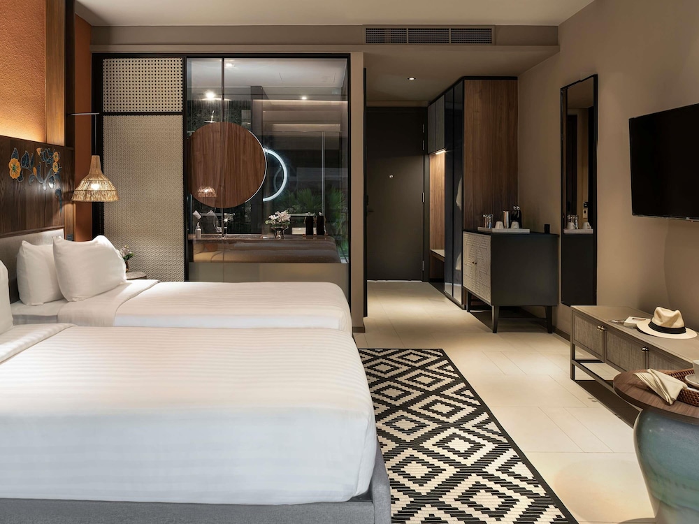 Habitación deluxe con camas gemelas del hotel Grand Mercure Khao Lak Bangsak. Foto 4