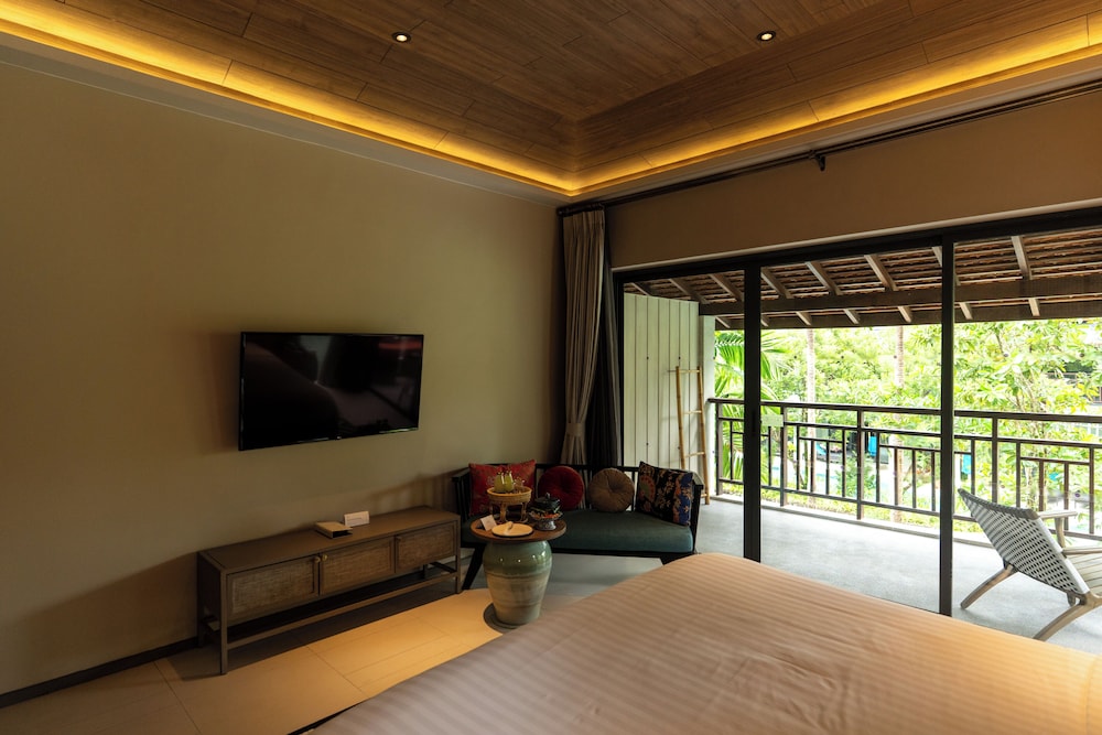 Habitación Deluxe con 1 cama king size del hotel Grand Mercure Khao Lak Bangsak. Foto 1