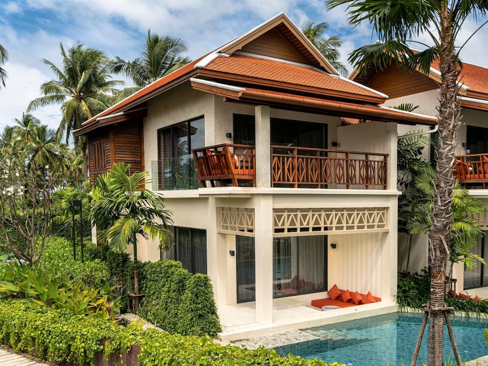 Habitación deluxe con acceso a la piscina y camas gemelas del hotel Grand Mercure Khao Lak Bangsak. Foto 4
