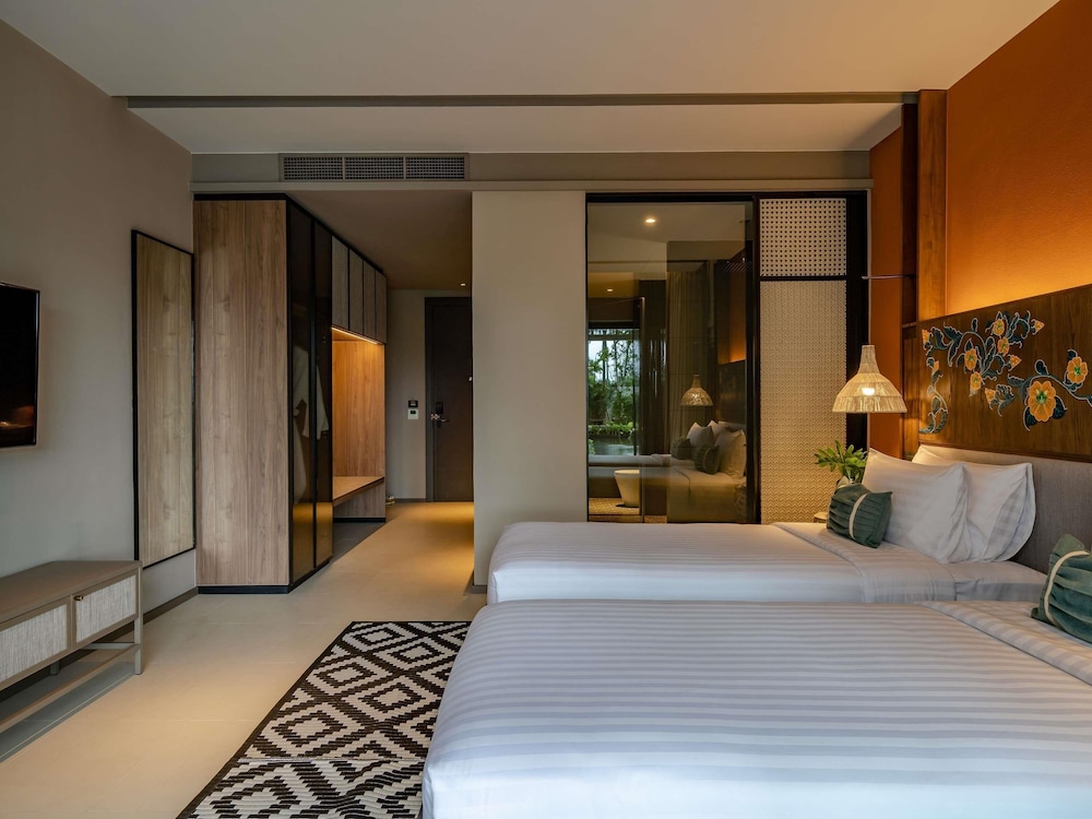 Habitación deluxe con camas gemelas del hotel Grand Mercure Khao Lak Bangsak. Foto 13