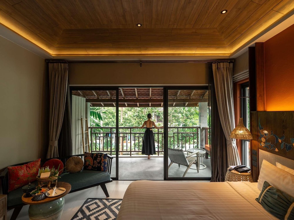 Habitación Deluxe con 1 cama king size del hotel Grand Mercure Khao Lak Bangsak. Foto 16
