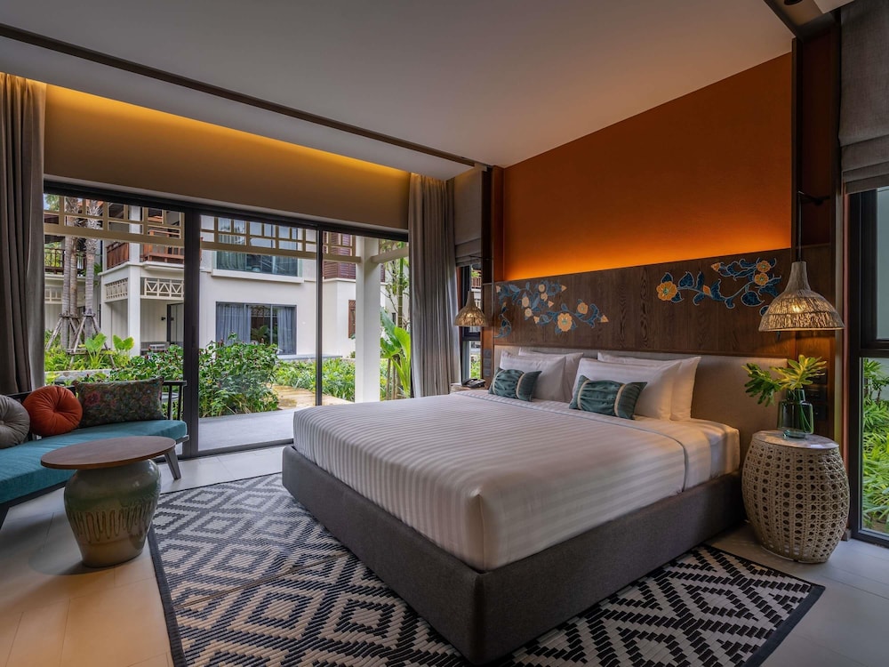Habitación Deluxe con 1 cama king size del hotel Grand Mercure Khao Lak Bangsak. Foto 12