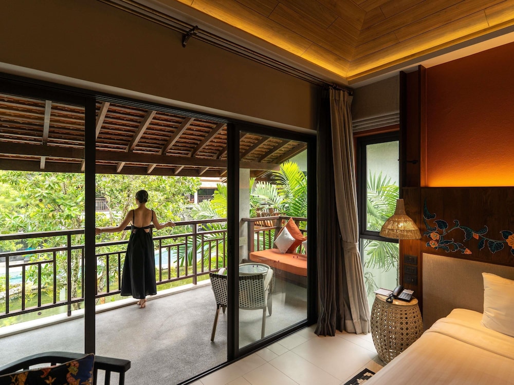 Habitación deluxe con camas gemelas del hotel Grand Mercure Khao Lak Bangsak. Foto 14