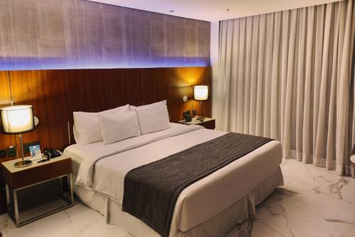 Habitación Deluxe con vistas a la montaña del hotel Nacional Rio De Janeiro Oficial. Foto 2