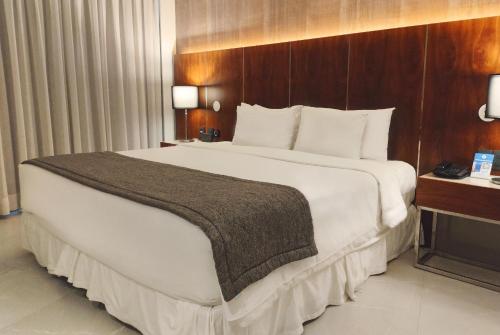Habitación Deluxe con vistas al mar del hotel Nacional Rio De Janeiro Oficial. Foto 7