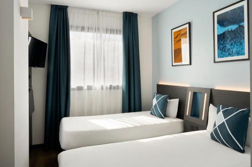 Habitación Doble Estándar - 2 camas del hotel Four Points Flex by Sheraton Malaga Centre. Foto 4
