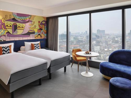 Habitación Deluxe con 2 camas individuales del hotel ibis Styles Jakarta Tanah Abang