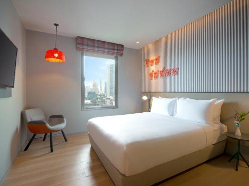 Habitación Estándar - 1 cama grande del hotel Ibis Styles Bangkok Sukhumvit 4. Foto 2