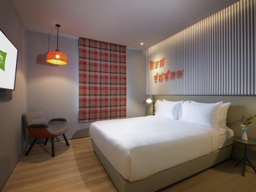 Habitación Estándar - 1 cama grande del hotel Ibis Styles Bangkok Sukhumvit 4