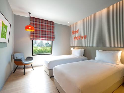 Habitación Doble Estándar - 2 camas del hotel Ibis Styles Bangkok Sukhumvit 4. Foto 4
